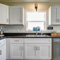 Standard White Kitchen Cabinets and Laminate Countertops